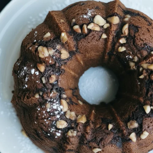 Delicious cake made with easy boxed cake mix recipe, topped with frosting.